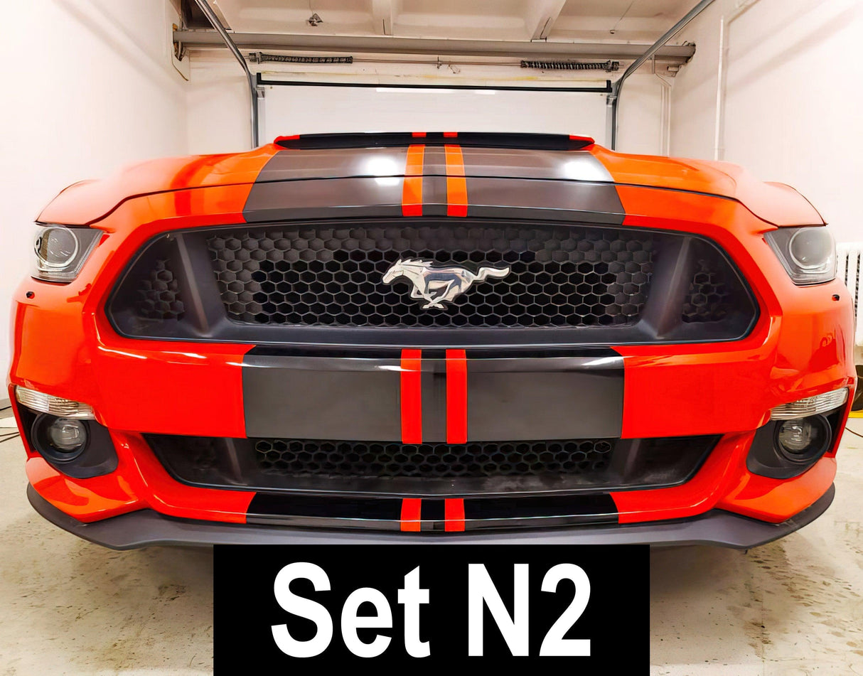 Front view of a stylish orange car with black racing stripes and grill, showcasing the Set N2 car decals.