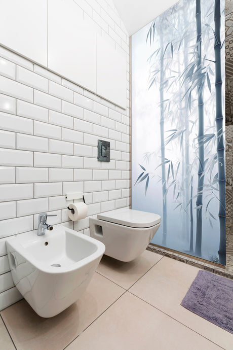 Bathroom featuring Tranquil Bamboo Forest vinyl shower door decal for privacy and serenity.