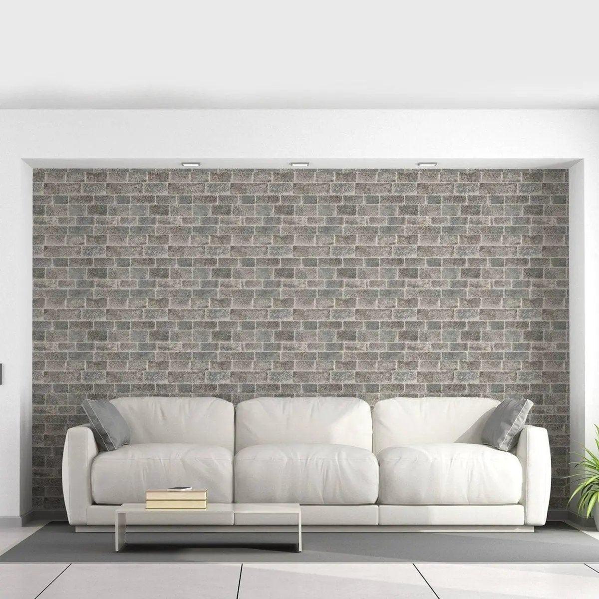 3D faux stone wall panel in stylish living room with white couch and modern decor