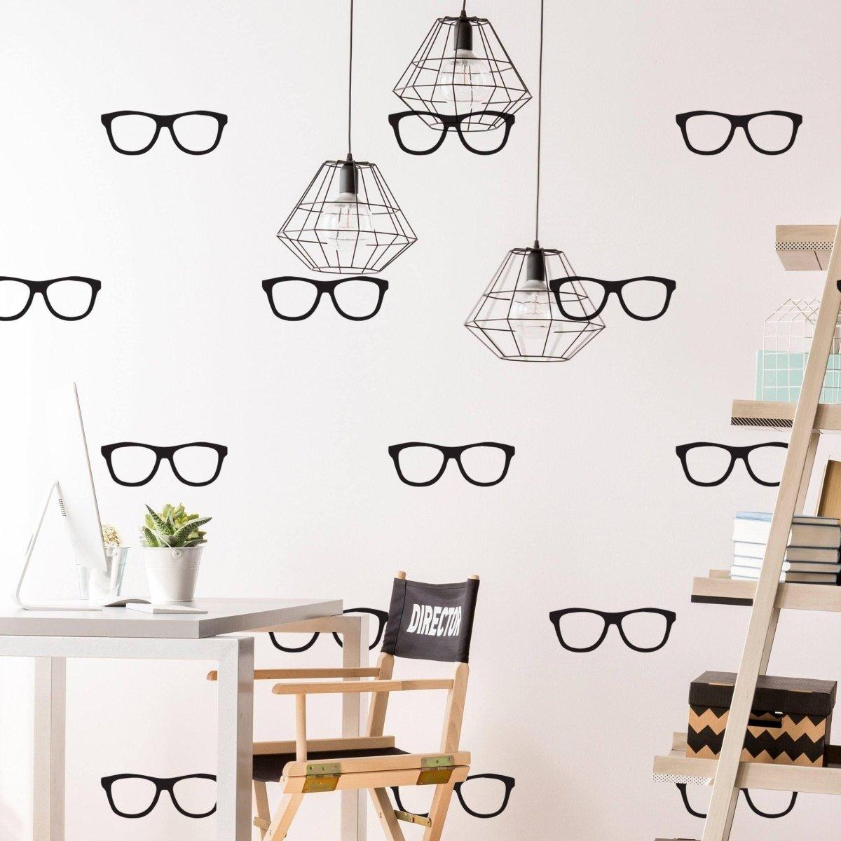 Room with glasses wall decals and modern decor, featuring black spectacles stickers on the wall.