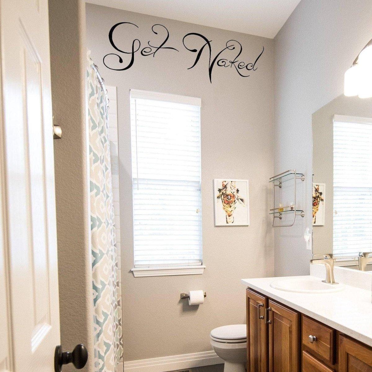 Chic bathroom featuring 'Get Naked' wall decal, adding humor and style to the decor with smooth surfaces and quality design.