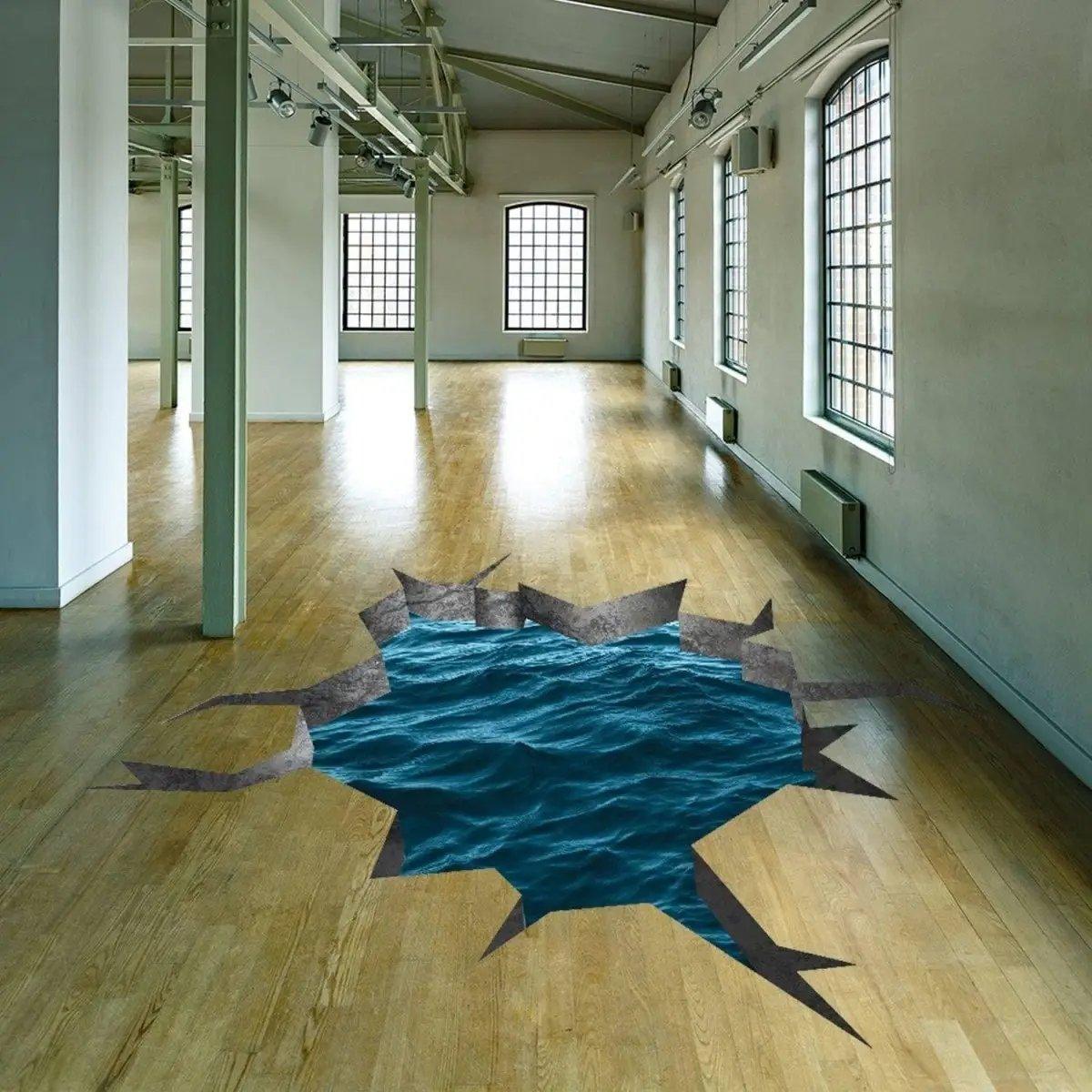 3D blue ocean wall decal creating an immersive underwater view in a modern room with wooden floor.