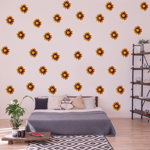 Boho Blossom Daisy wall stickers in a stylish bedroom, featuring vibrant brown flower decals on white walls.