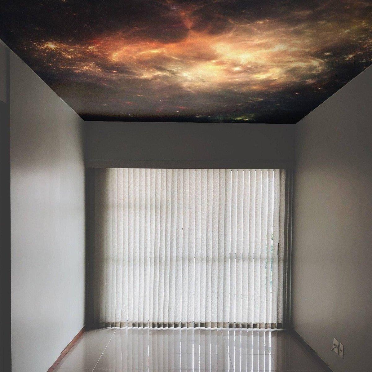 Majestic celestial vinyl ceiling decal featuring a stunning galaxy design in a modern room.