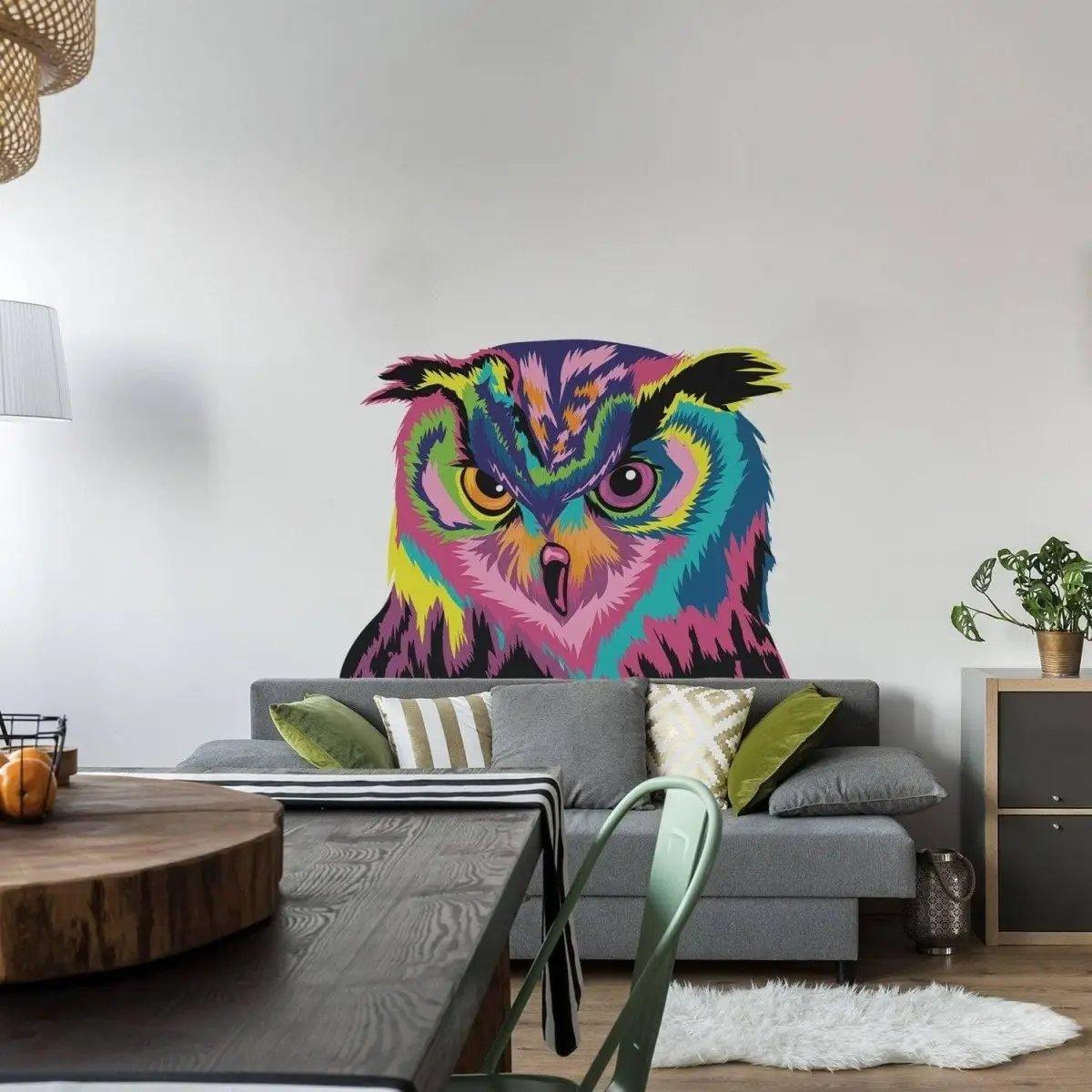 Colorful owl wall sticker on a living room wall, adding charm and vibrancy to the decor.