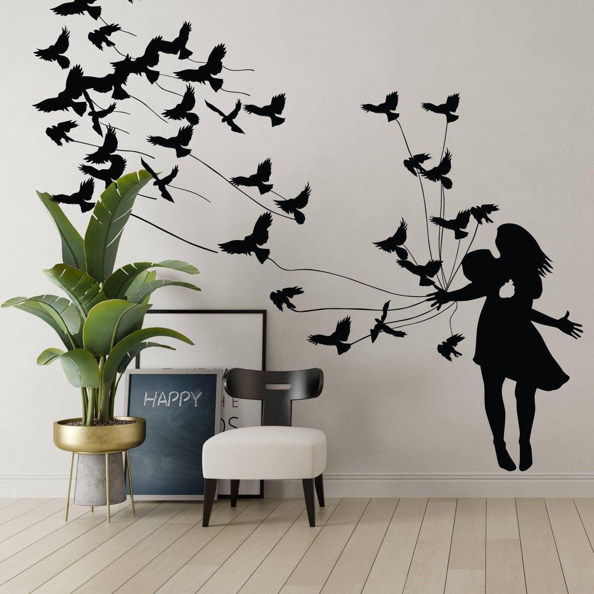 Artistic wall sticker of a girl surrounded by flying birds, perfect for enhancing creative home decor.