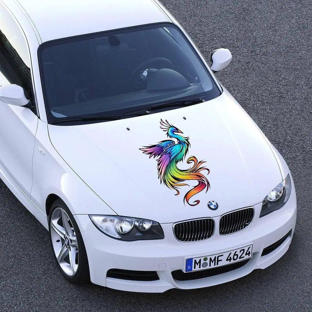 Custom vinyl car hood graphic with colorful phoenix design on a white BMW.
