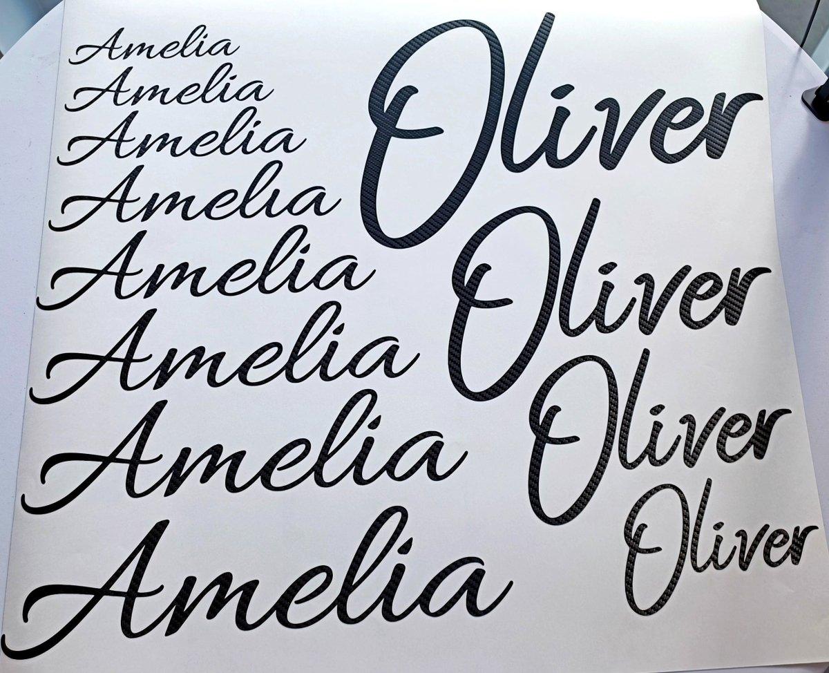 Personalized carbon fiber letter stickers displaying names Amelia and Oliver in various stylish fonts.