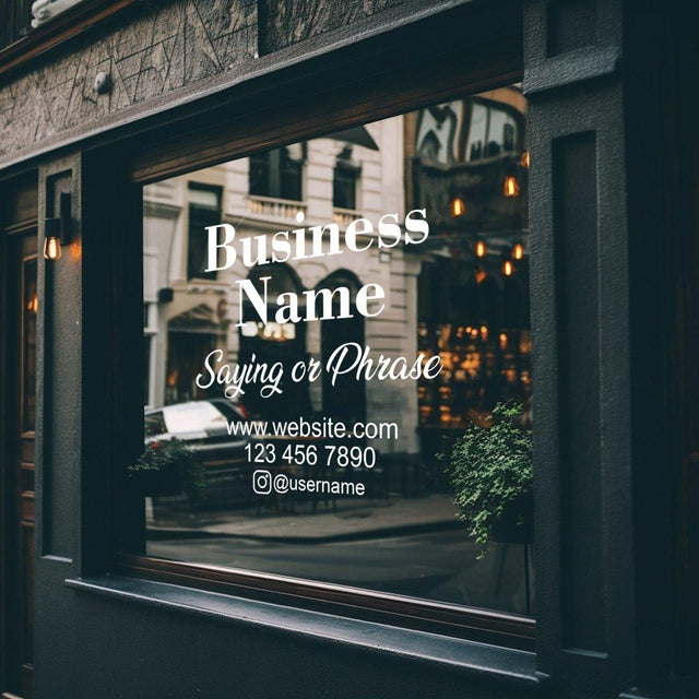 Customizable business window decal displaying name and contact info on storefront.