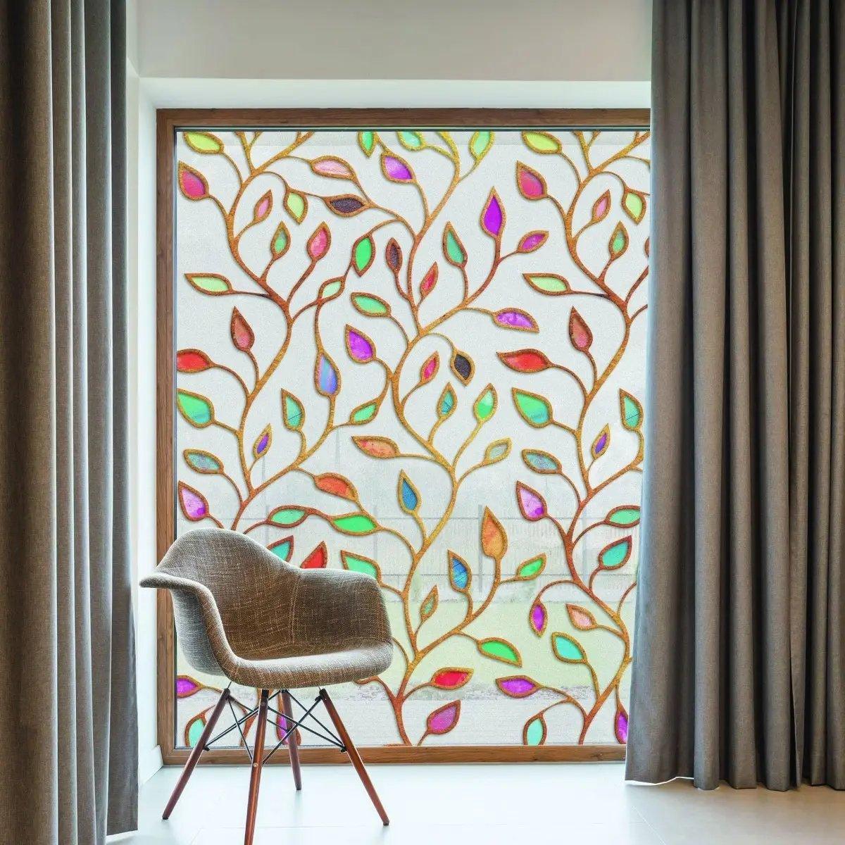 Elegant etched leaf design privacy glass film enhancing natural light and style in a modern home interior.