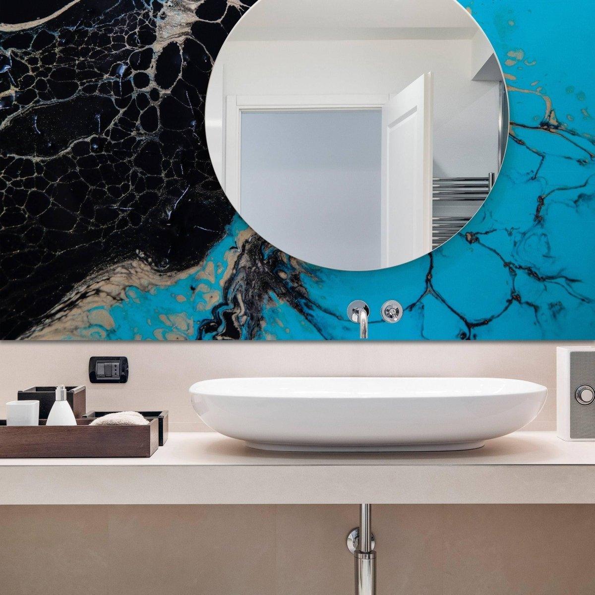 Modern bathroom featuring elegant marble wall covering and stylish round mirror above a sleek white sink.