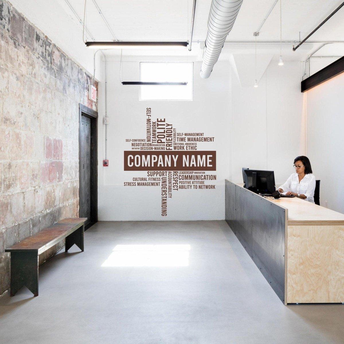 Elegant workspace with wall decal showcasing company name and keywords for office decor enhancement.