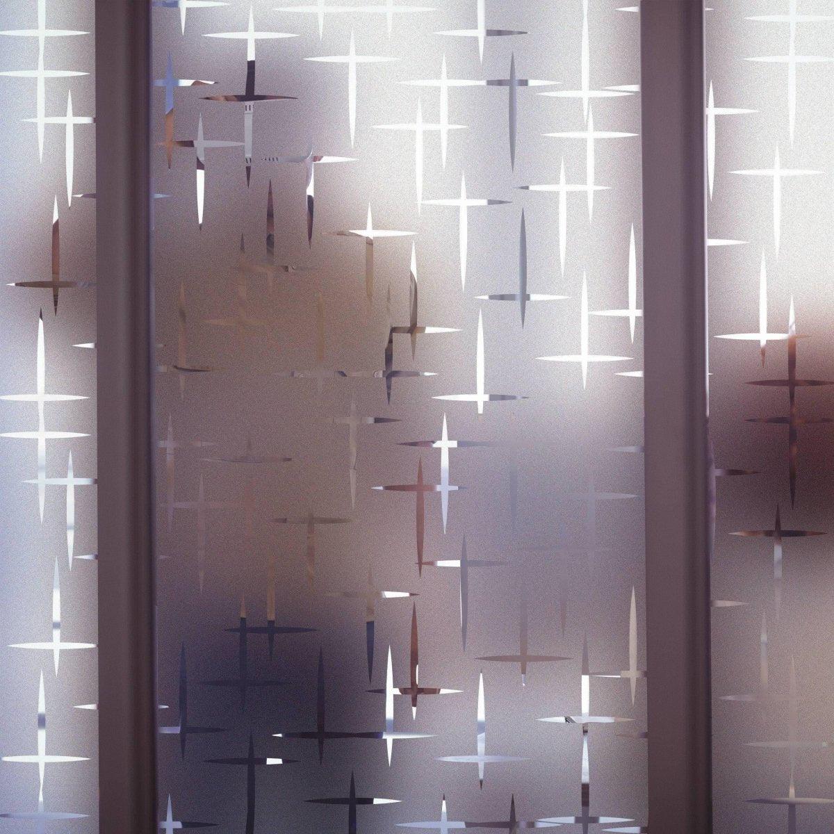 Chic frosted privacy film window decal with stylish starburst pattern, providing privacy while allowing natural light.