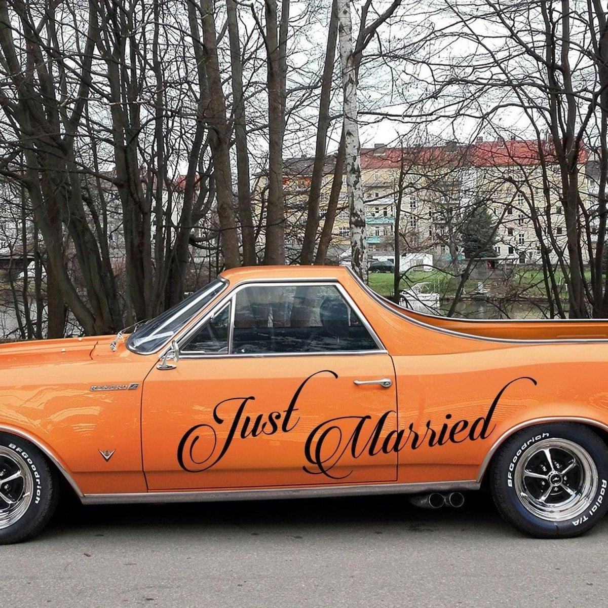 Just Married car sticker on an orange vehicle, perfect for wedding day car decoration.