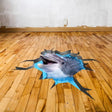 3D vinyl floor decal featuring a dolphin emerging from a cracked wooden floor design.