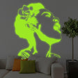 Glow in the dark wall decal of a woman singing, illuminating a modern living room with vibrant colors.