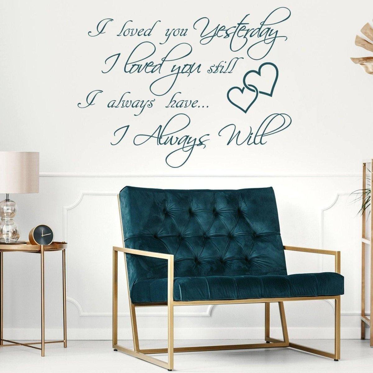 Love Forever wall sticker above a stylish blue chair, featuring romantic quotes and heart decorations.