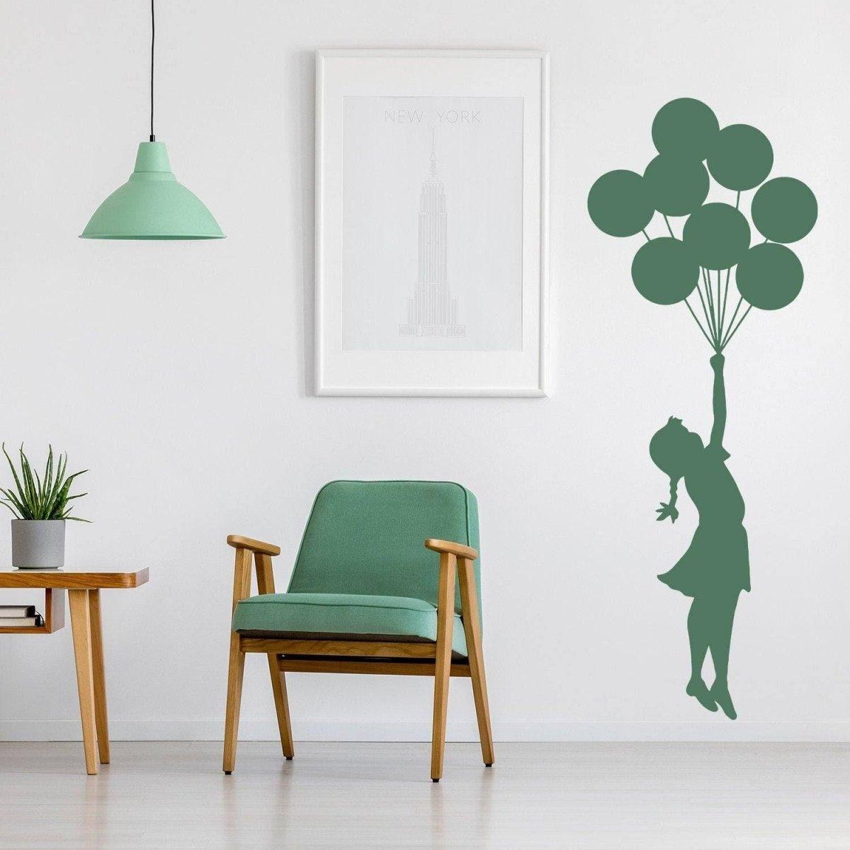 Ethereal Dreams removable wall sticker of a girl with balloons, perfect for nurseries or bedrooms.