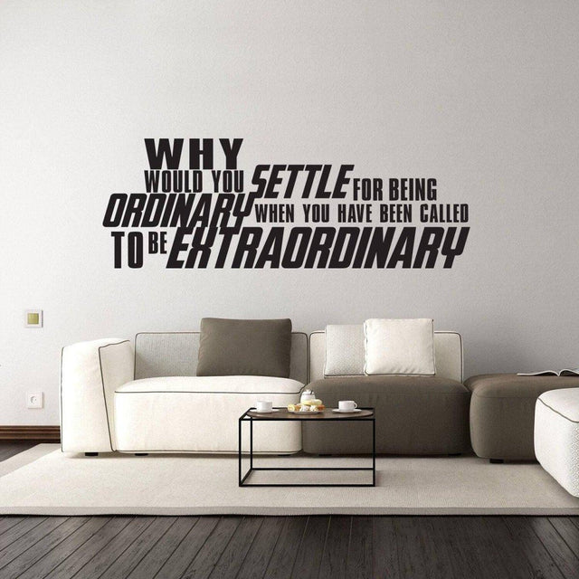 Inspirational wall sticker with motivational quote in modern living room decor setting.