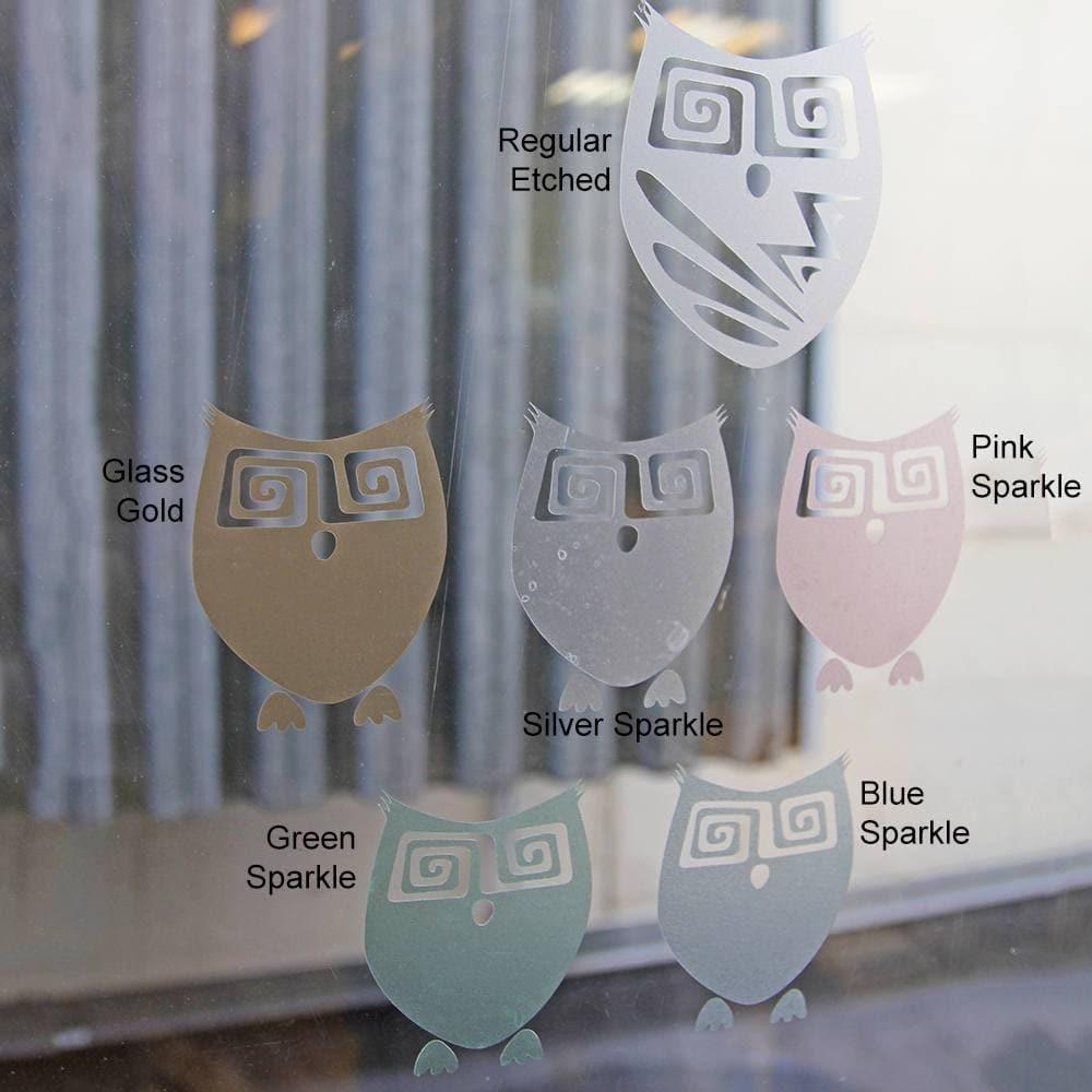 Colorful owl designs on a glass door sticker, featuring Regular, Glass Gold, Pink, Silver, Green, and Blue Sparkle options.