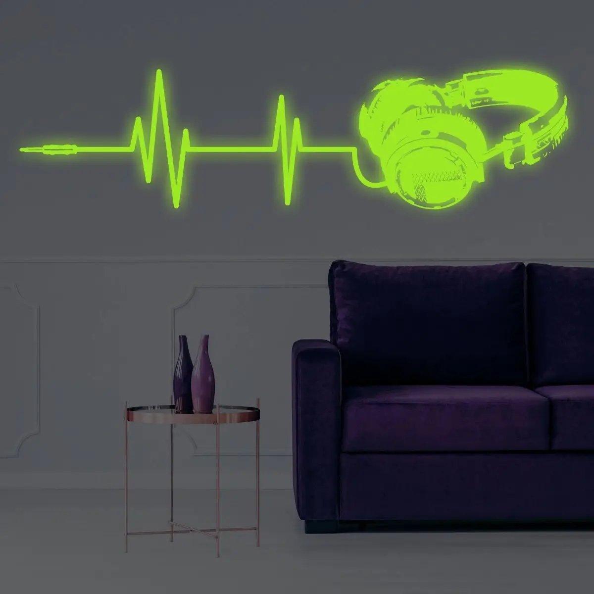Luminous vinyl wall decal of headphones and sound waves, perfect for transforming your space with glow-in-the-dark art.
