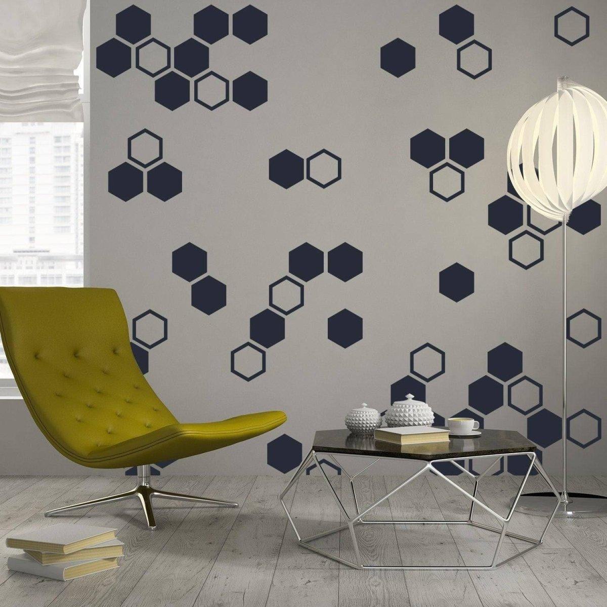 Elegant geometric hexagon wall decals in a modern living room setting, featuring a stylish yellow chair and minimalist decor.