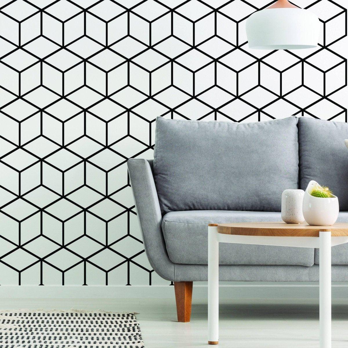 Stylish room featuring a hexagonal honeycomb wall decal behind a modern gray sofa and a wooden coffee table.