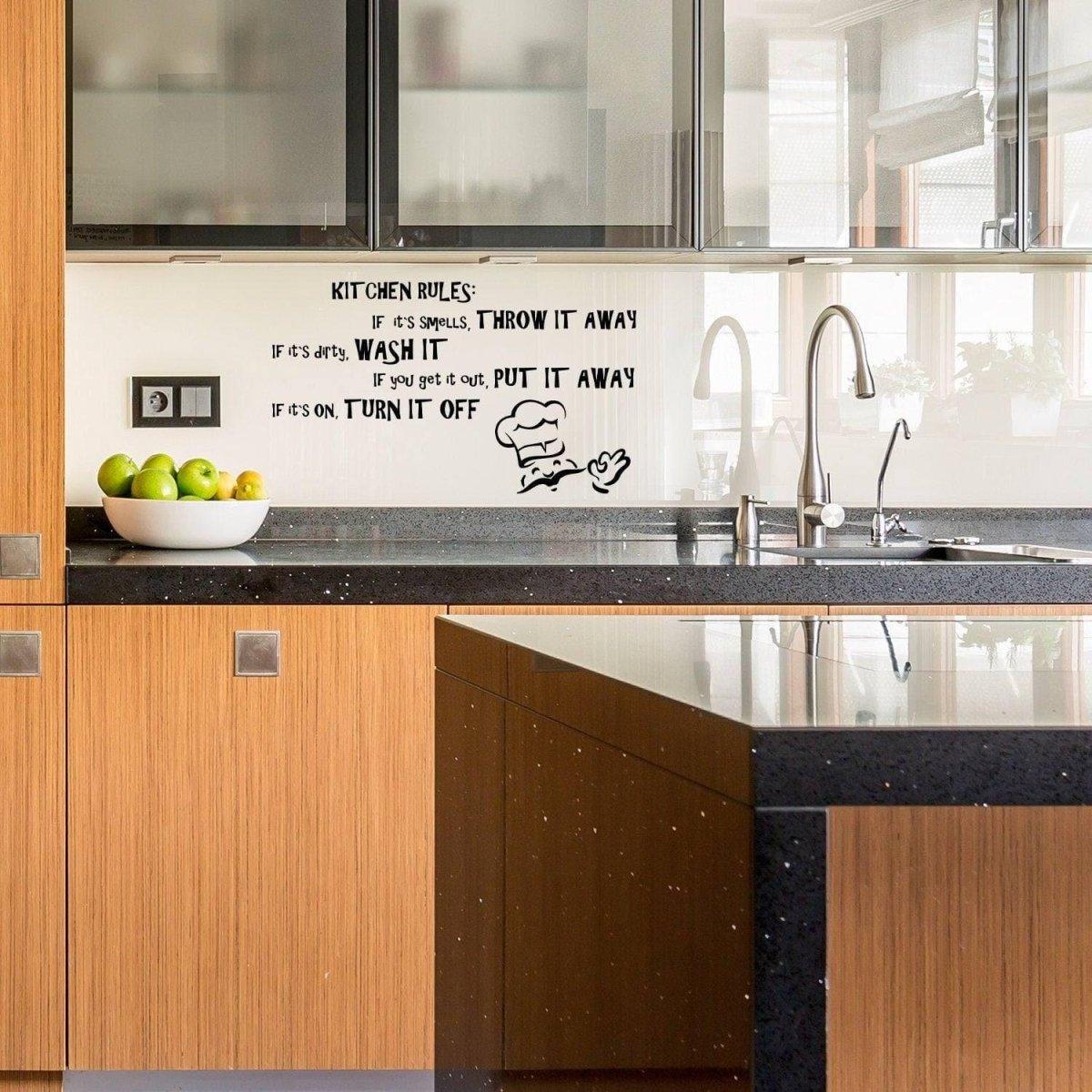 Family rules wall decal in modern kitchen design, featuring humorous kitchen rules on wall above sink.