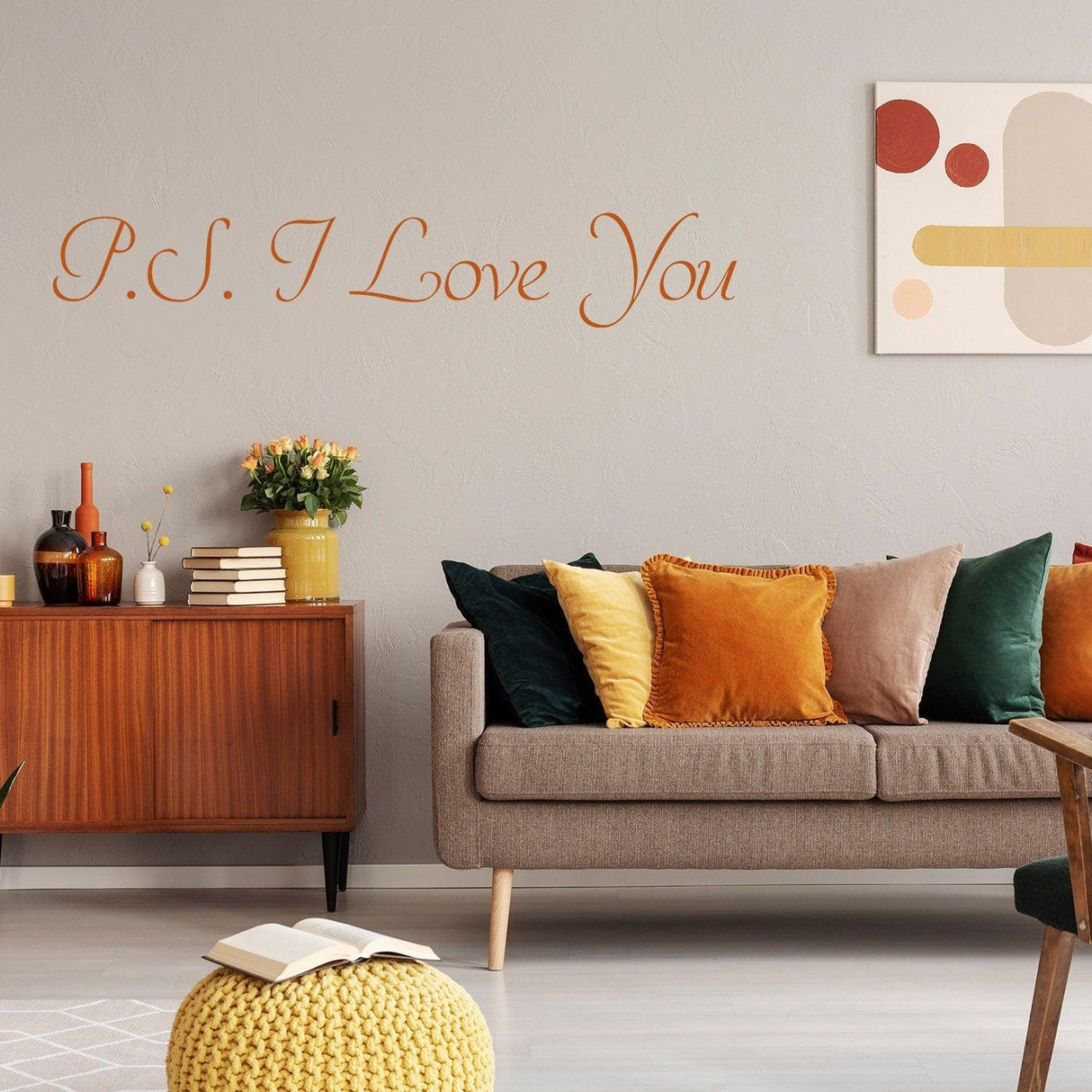 P.S. I Love You wall sticker in a cozy living room with stylish decor and colorful cushions.