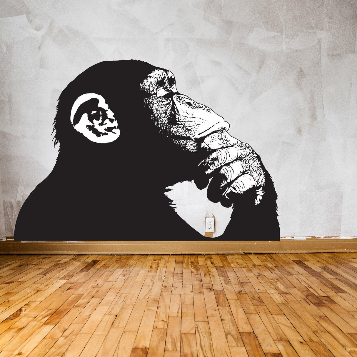 Thinking Monkey wall sticker in a modern room, featuring a contemplative monkey design inspired by Banksy.