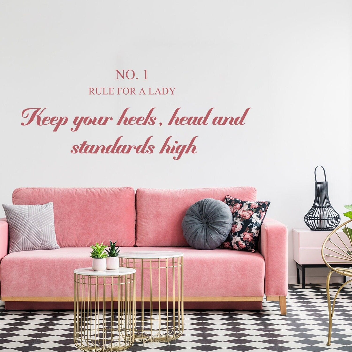 Rule For A Lady wall sticker above a pink couch, inspiring female empowerment with stylish font design.