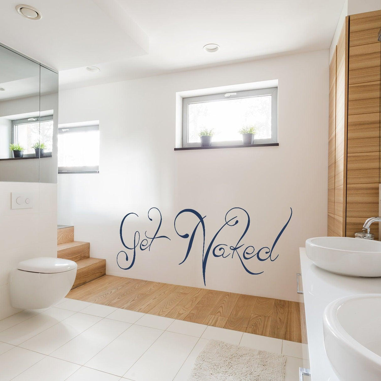 Get Naked wall sticker in a modern bathroom, adding a fun and playful touch to the decor.
