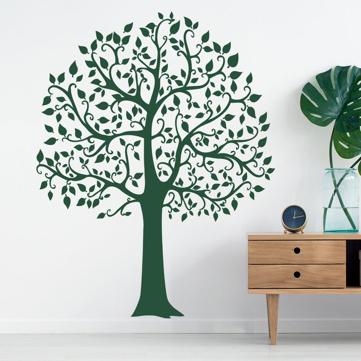 Green tree wall decal with detailed branches and leaves, enhancing room decor and adding a natural touch.
