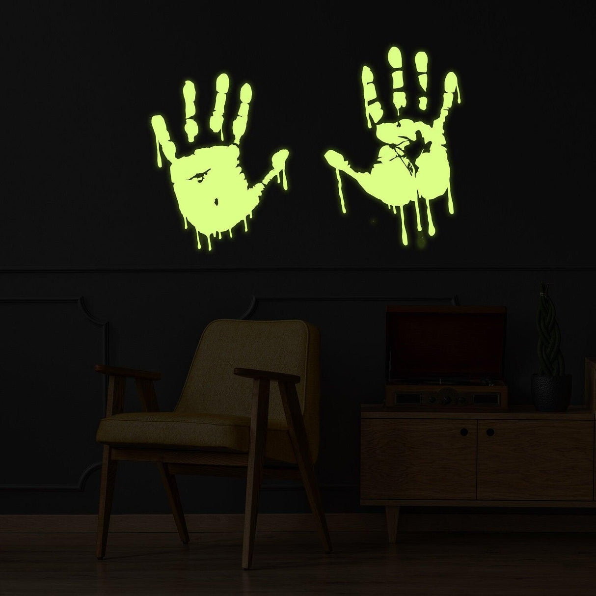 Glow in dark bloody hands vinyl sticker on wall, perfect for spooky decor in car or home.