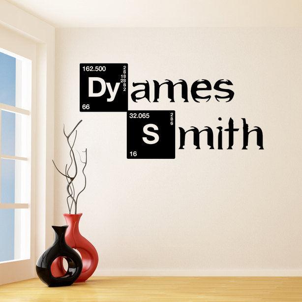 Custom text vinyl sticker on wall spelling 'Dyamessmith' in an artistic design with black and white elements.