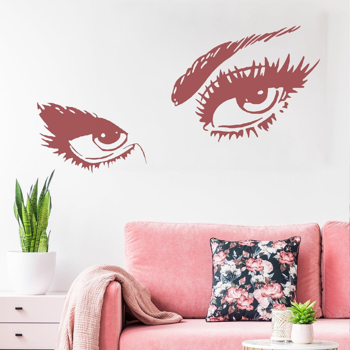 Vinyl wall sticker of a woman's eye with long lashes, perfect for beauty salons and stylish home decor.