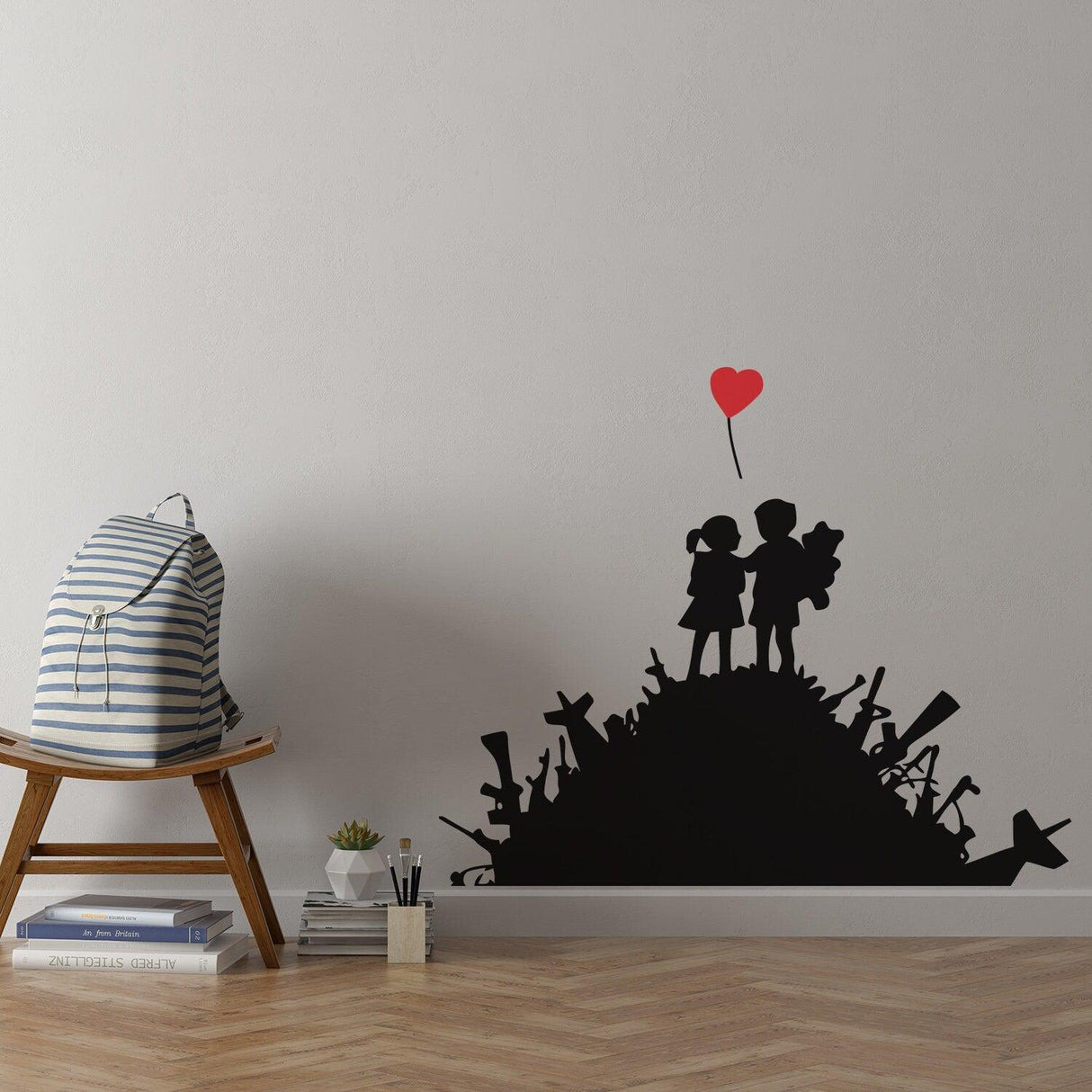 Banksy boy and girl wall sticker design with heart-shaped balloon, perfect for urban art decor in kids' rooms.