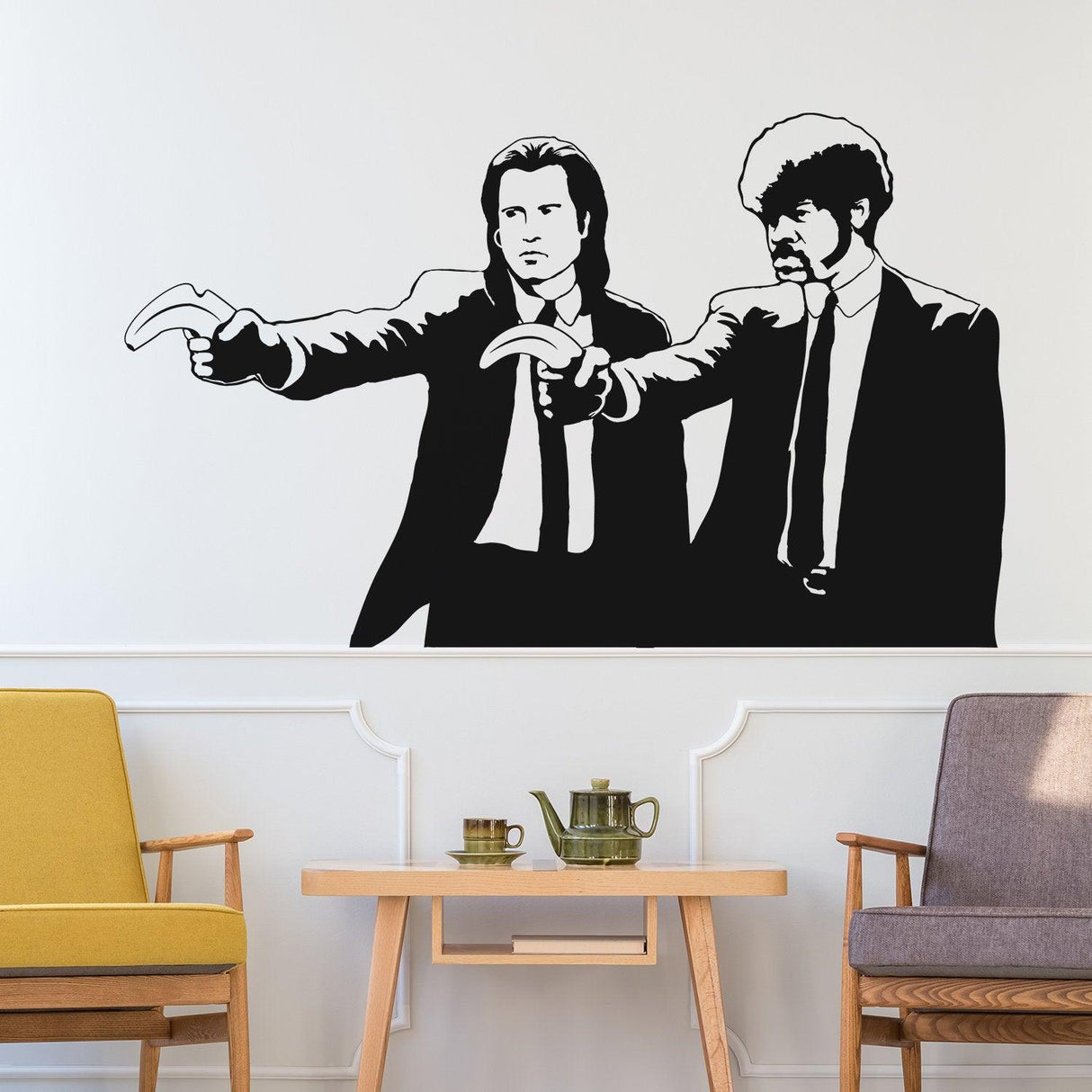 Banksy Pulp Fiction sticker wall art featuring two iconic characters in stencil design on a modern wall.