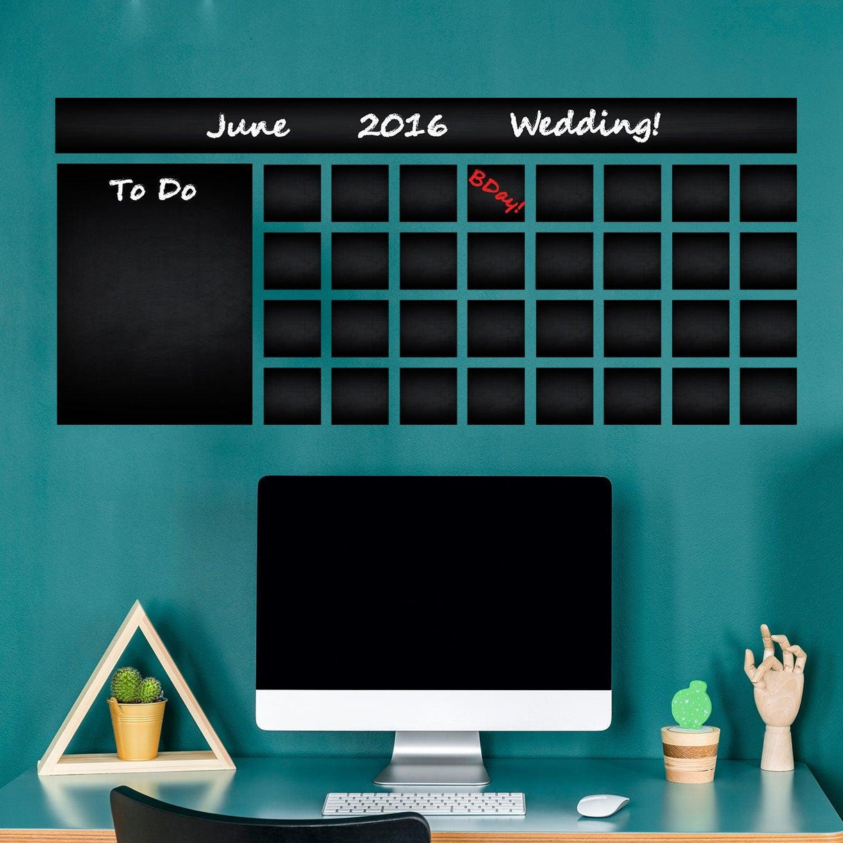 Office calendar chalkboard vinyl sticker on a teal wall, featuring editable spaces for planning and reminders.