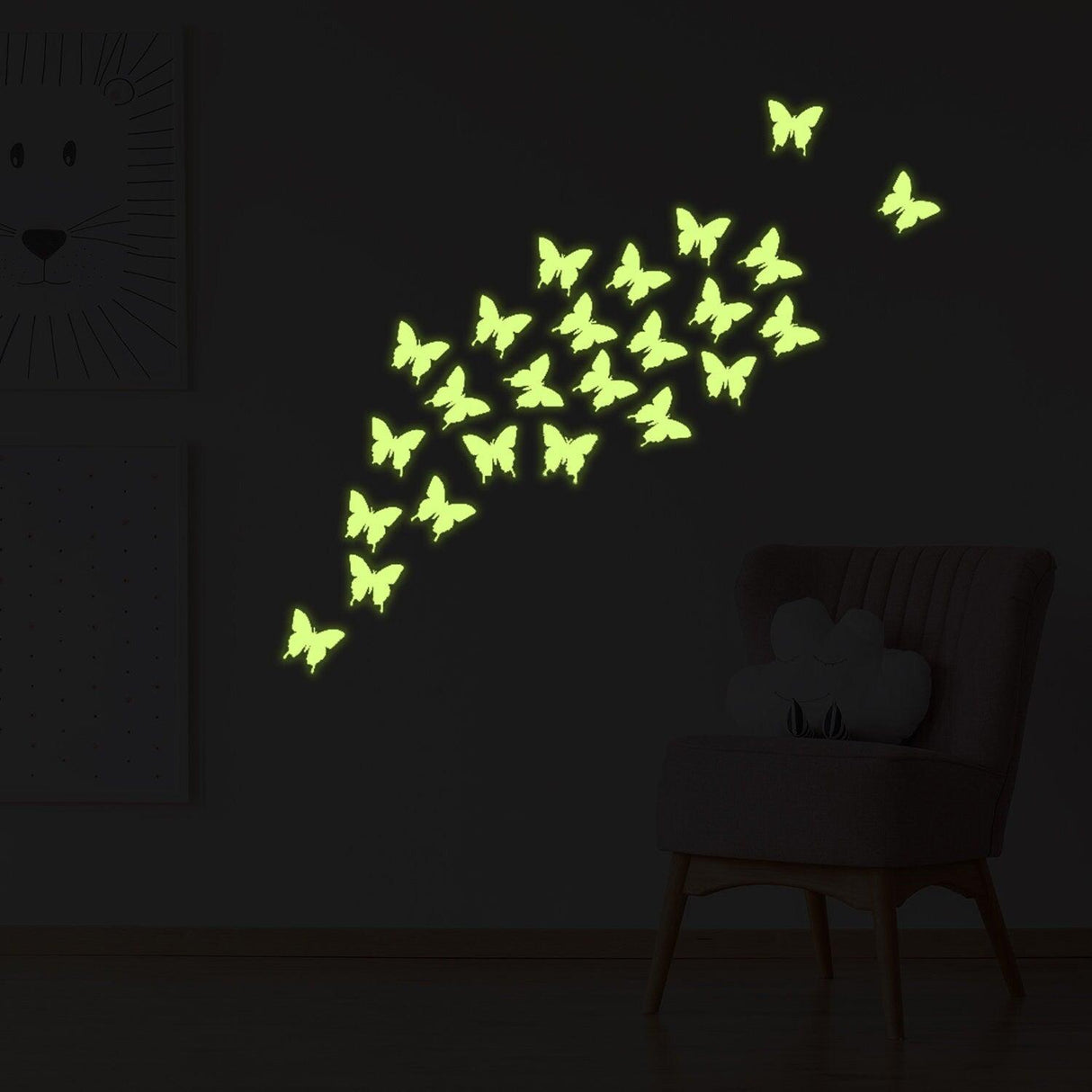 Glowing butterfly wall decals illuminating a dark room, creating a magical nighttime display.