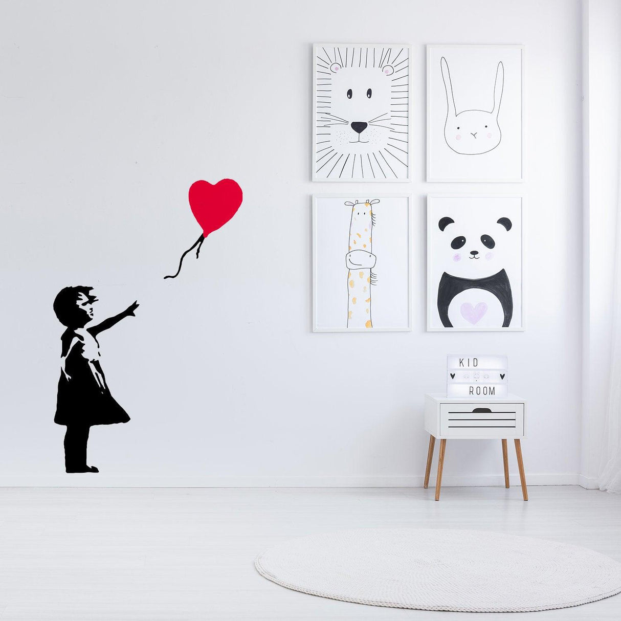 Banksy Girl With Heart Balloon wall sticker in a modern kid's room, featuring iconic black and white design with red balloon.