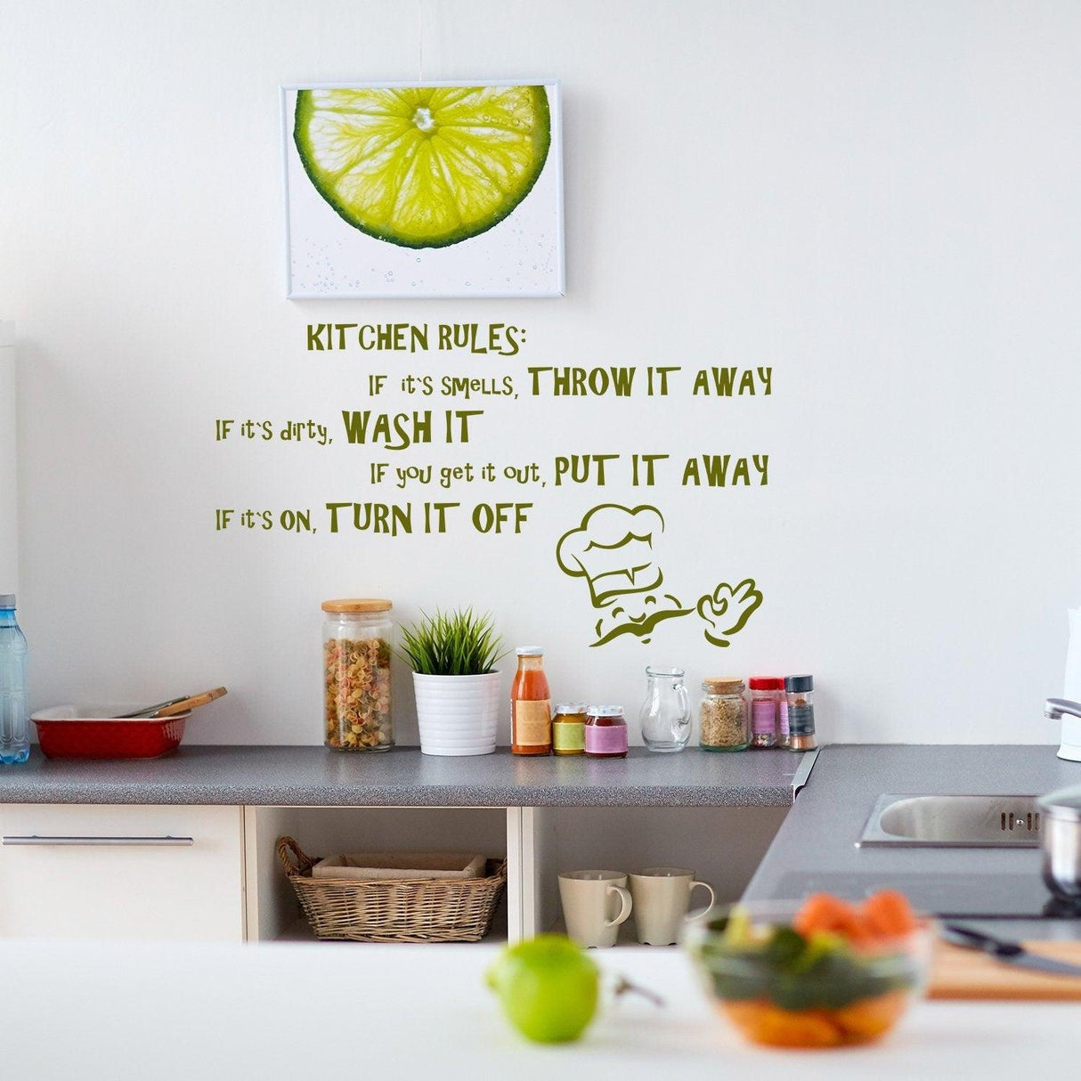 Family kitchen rules vinyl wall sticker with funny sayings and chef illustration in a bright kitchen.