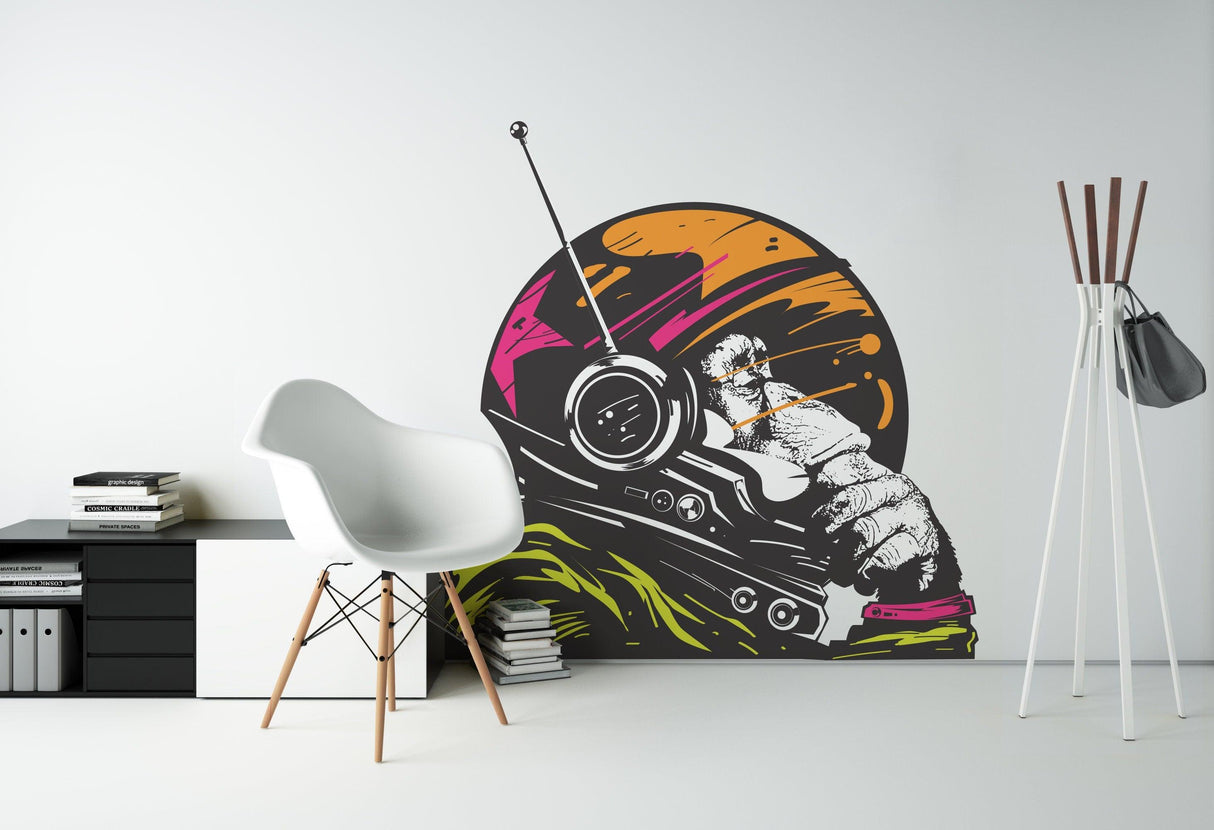 Astronaut Space Monkey vinyl sticker on wall, featuring a colorful cosmonaut chimp illustration in a modern room.