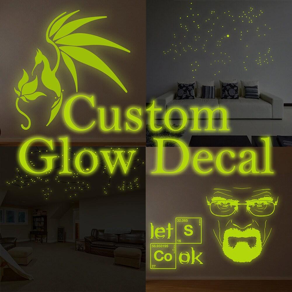 Custom glowing vinyl wall decals showcasing creative designs for personalized room decor.