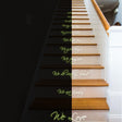 Glow in dark quote stair sticker featuring family values like love, fun, and second chances on a staircase.