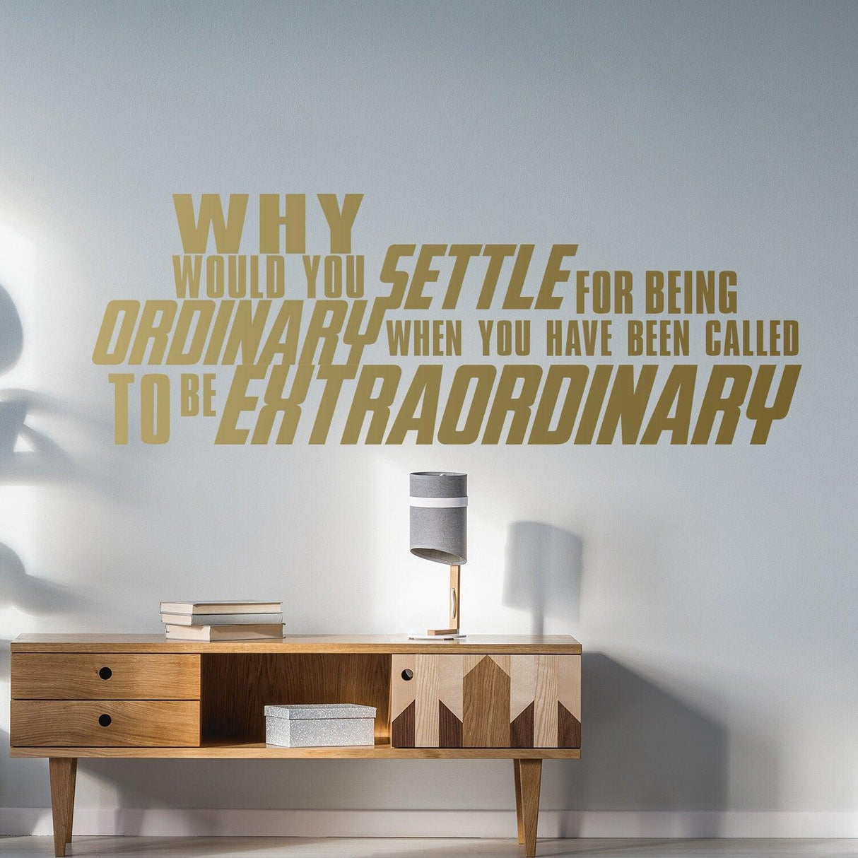Inspirational wall vinyl quote sticker in modern room decor with motivational quote about being extraordinary.
