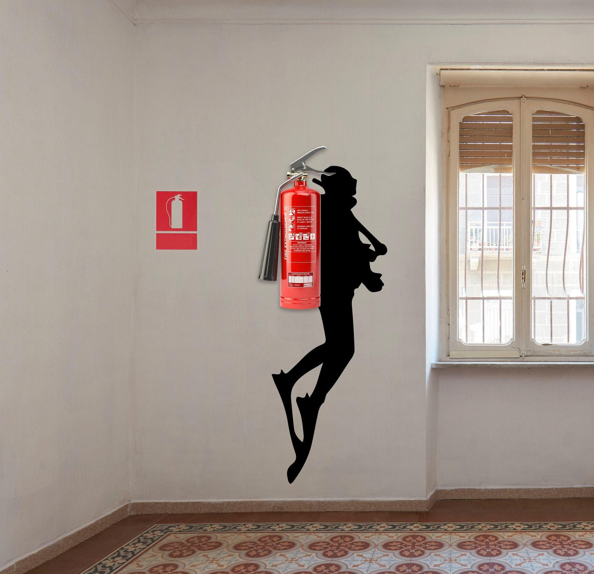 Scuba diver wall sticker featuring fire extinguisher silhouette in a bright room decor for diving enthusiasts.