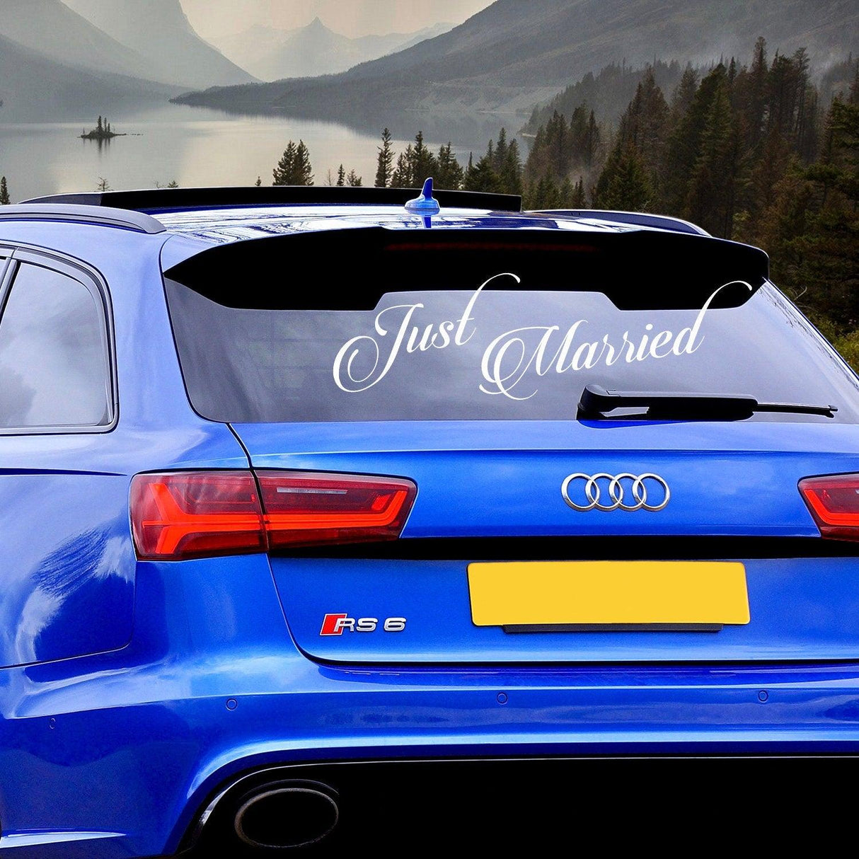 Just Married car vinyl sticker on blue Audi RS6, perfect for wedding decor and celebration.