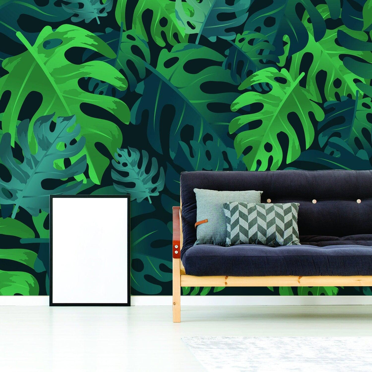 Vibrant green leaves wallpaper tapestry decor in a modern living room with cozy couch and decor elements.