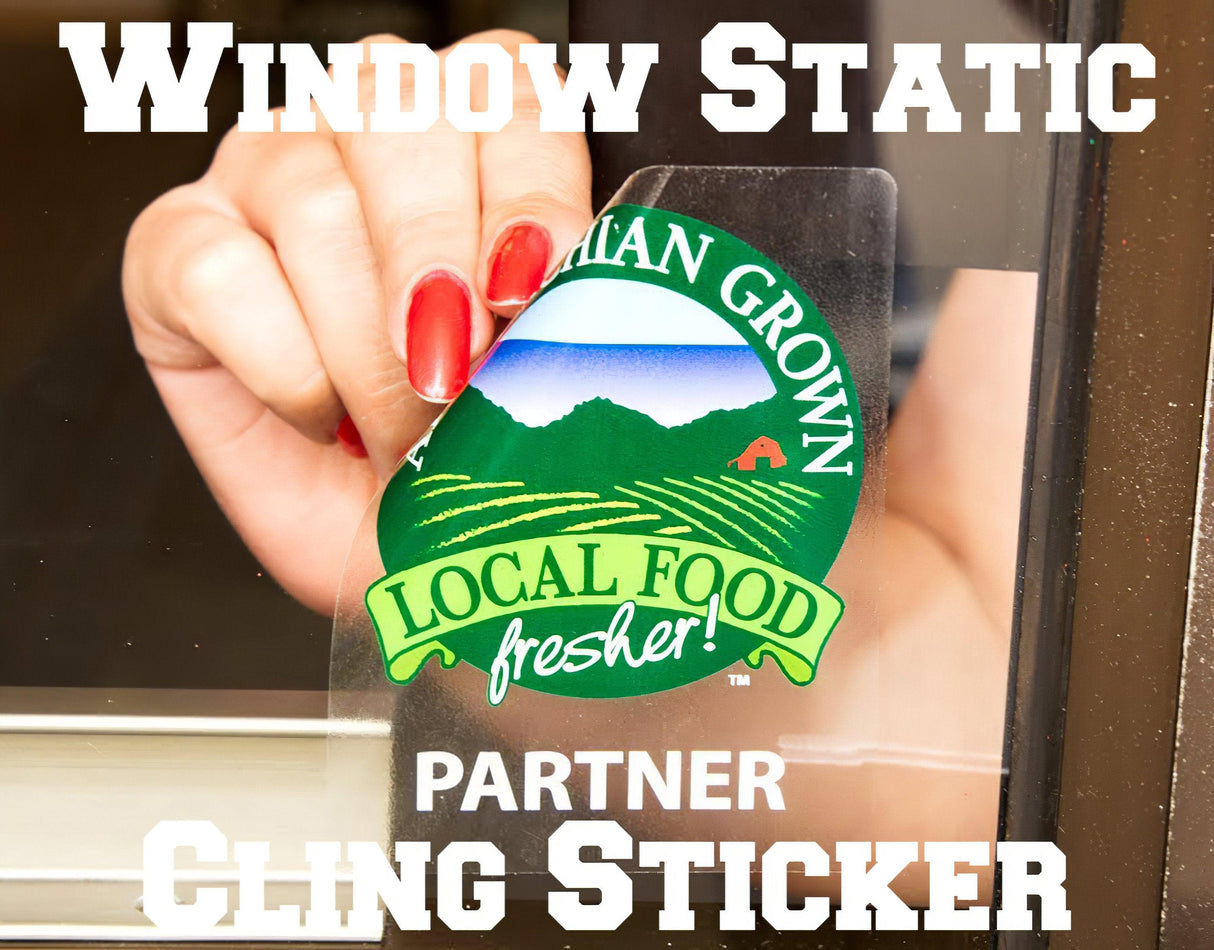 Custom static cling window sticker showcasing local food graphic on glass surface.